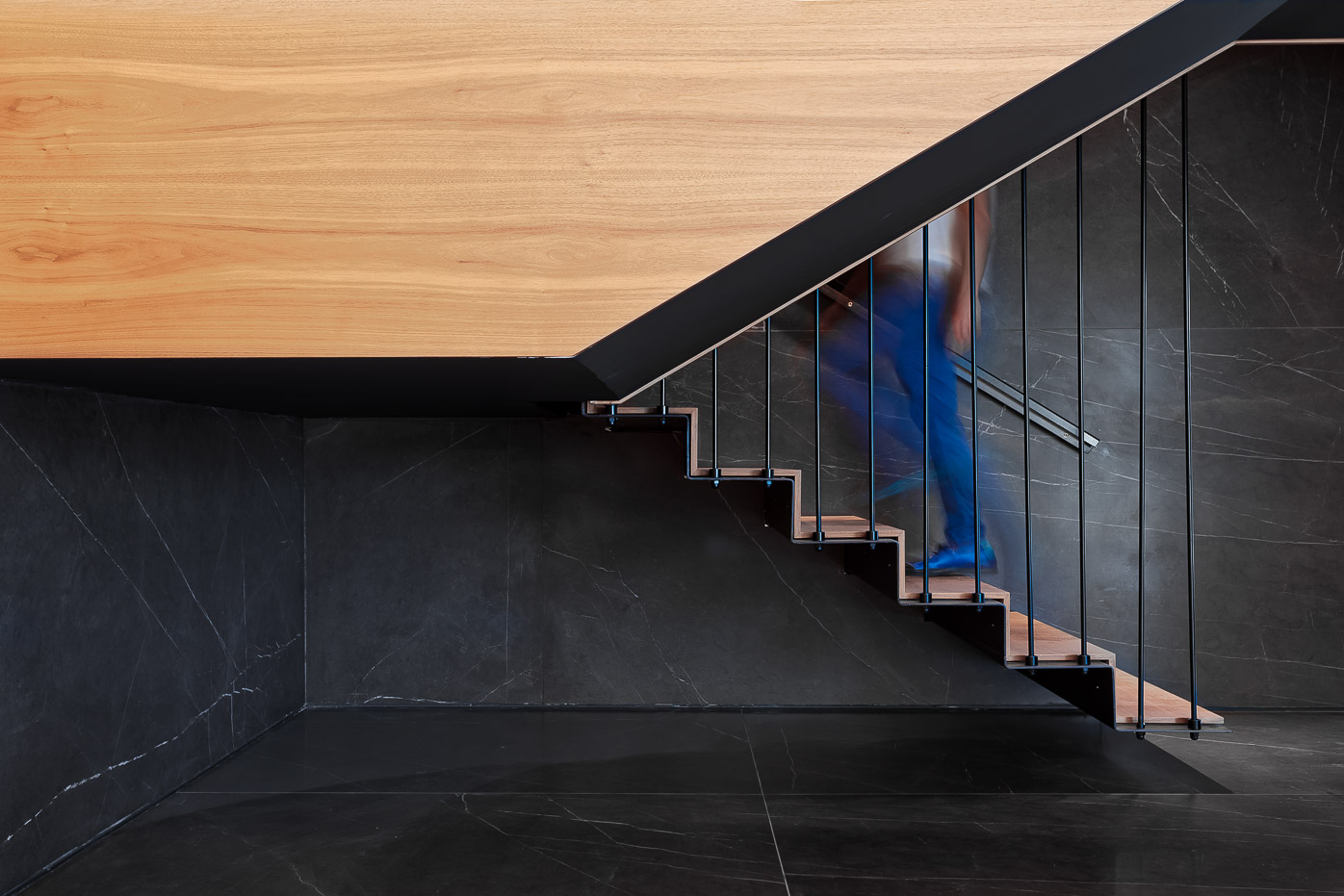 Stair detail, figure in motion