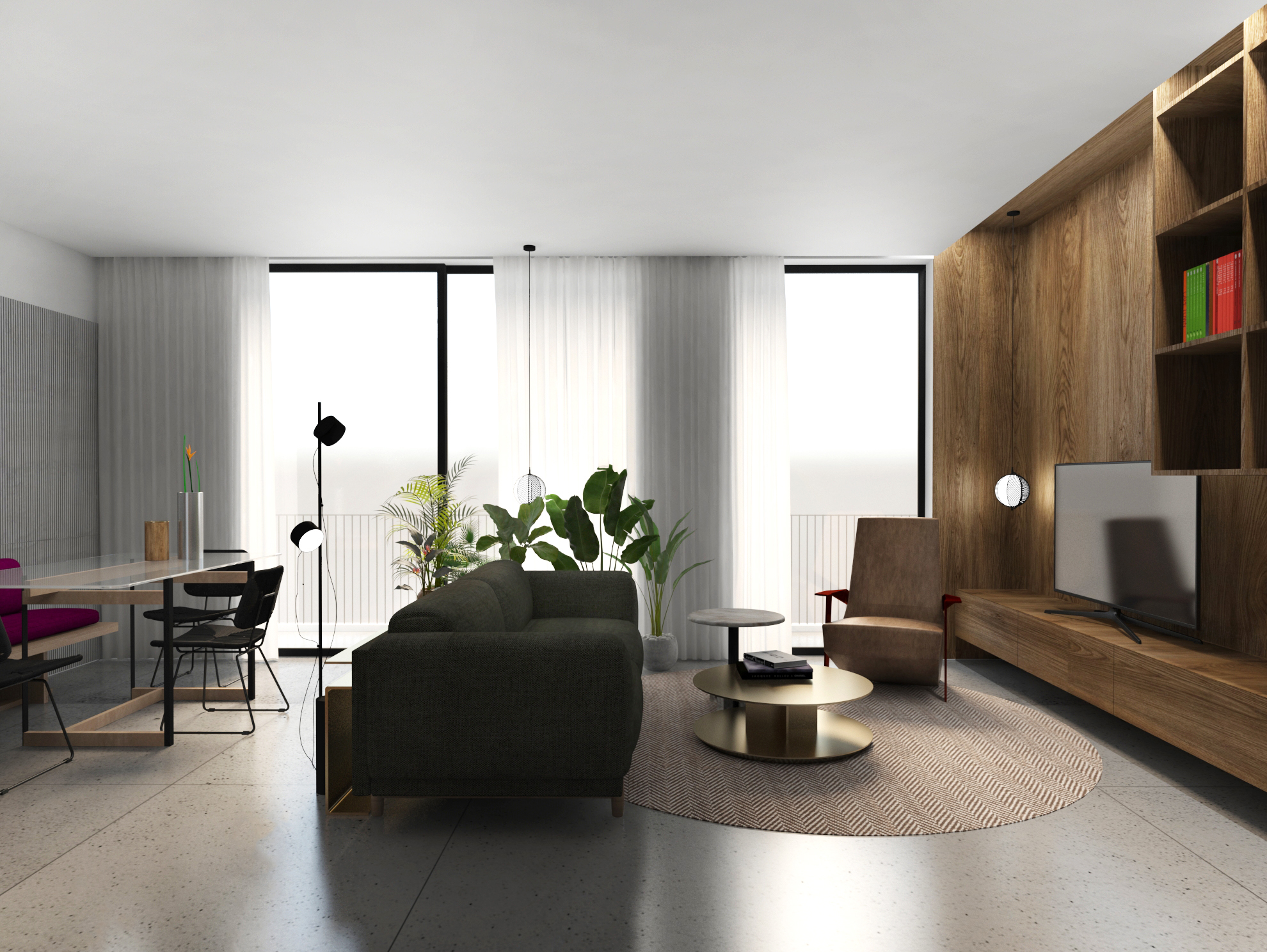 Living room from the side, looking across the dark green sofa to floor-to-ceiling windows